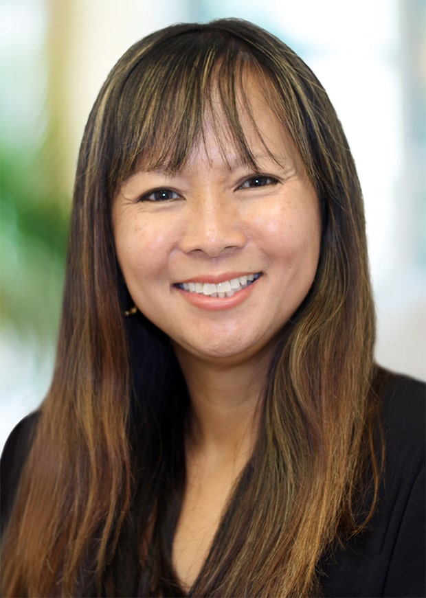 Karla Kohout, therapist at Clarity Counseling in Leawood, Kansas, seated for a professional portrait.